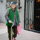 An unnamed woman with socks that say, “My favorite salad is wine.”